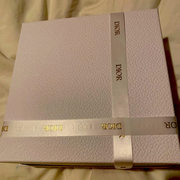 Brand new authentic rare and collectible texturedDior box with ribbon…